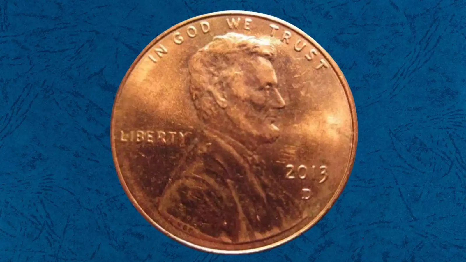 2013 penny die crack error showing raised crack line across Lincoln's portrait on the obverse